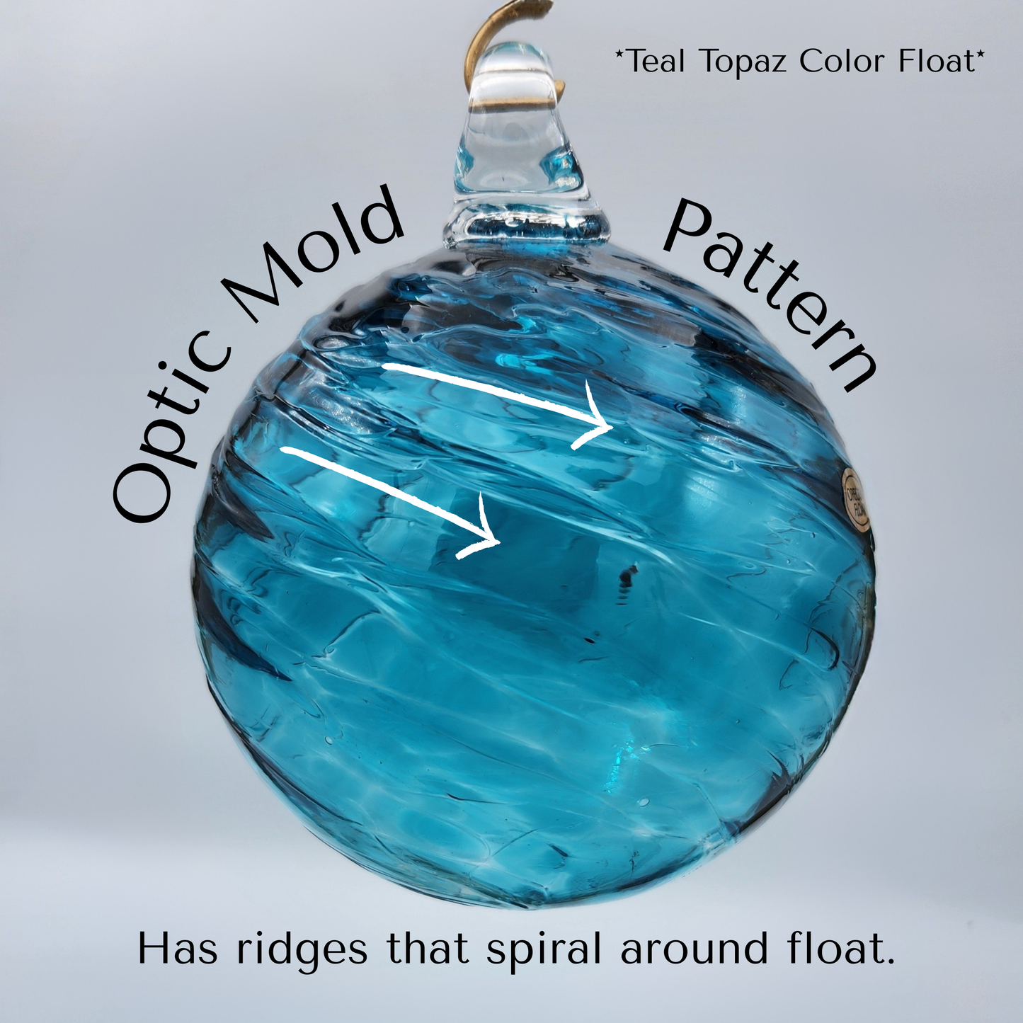 example of our optic mold color pattern. the glassblower places the glass in an optic mold and it creates uniform lines that spiral around the glass like the lines of a tornado.