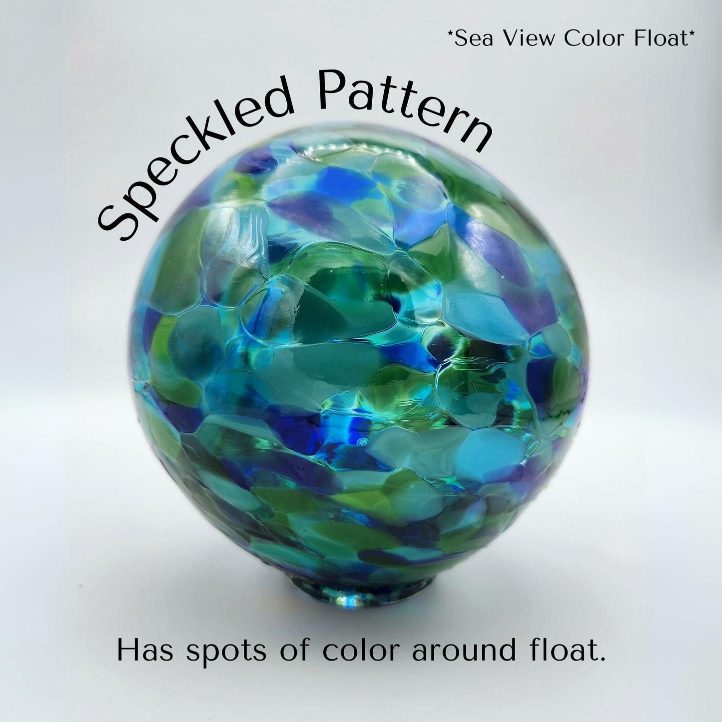 example of our speckled color pattern. the glassblower doesn't move the glass at all, leaving the color to melt into specs dotting and cover the surface of the float or ornament. it has a mosaic or speckled egg appearence 